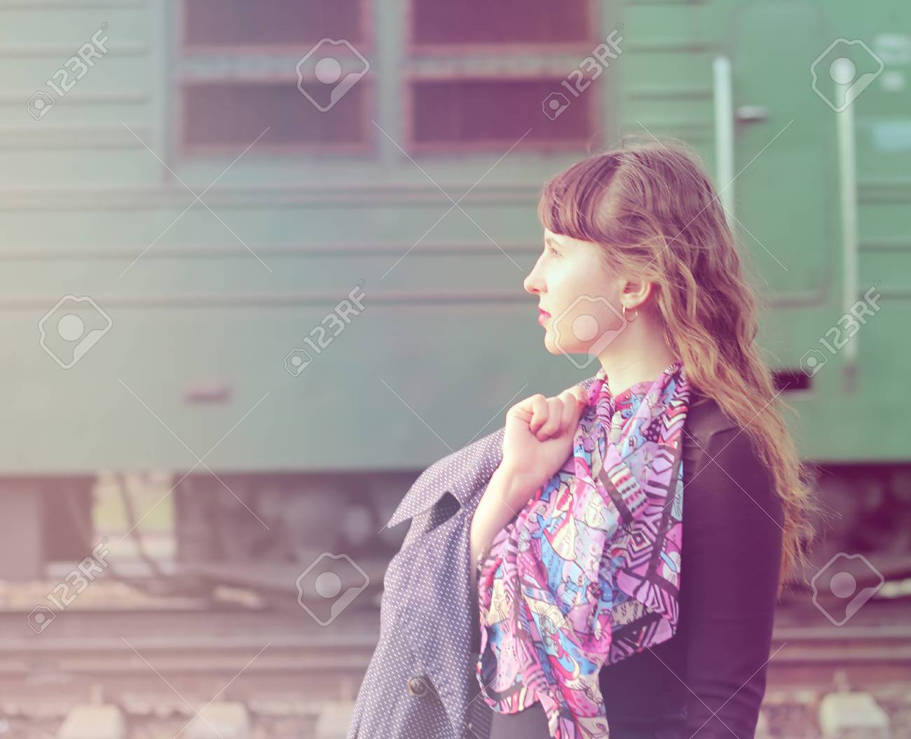 Pensive Beautiful Girl At The Railway Station And Passing On Stock Photo Picture And Royalty Free Image Image 114270699 pensive beautiful girl at the railway station and passing on stock photo picture and royalty free image image 114270699