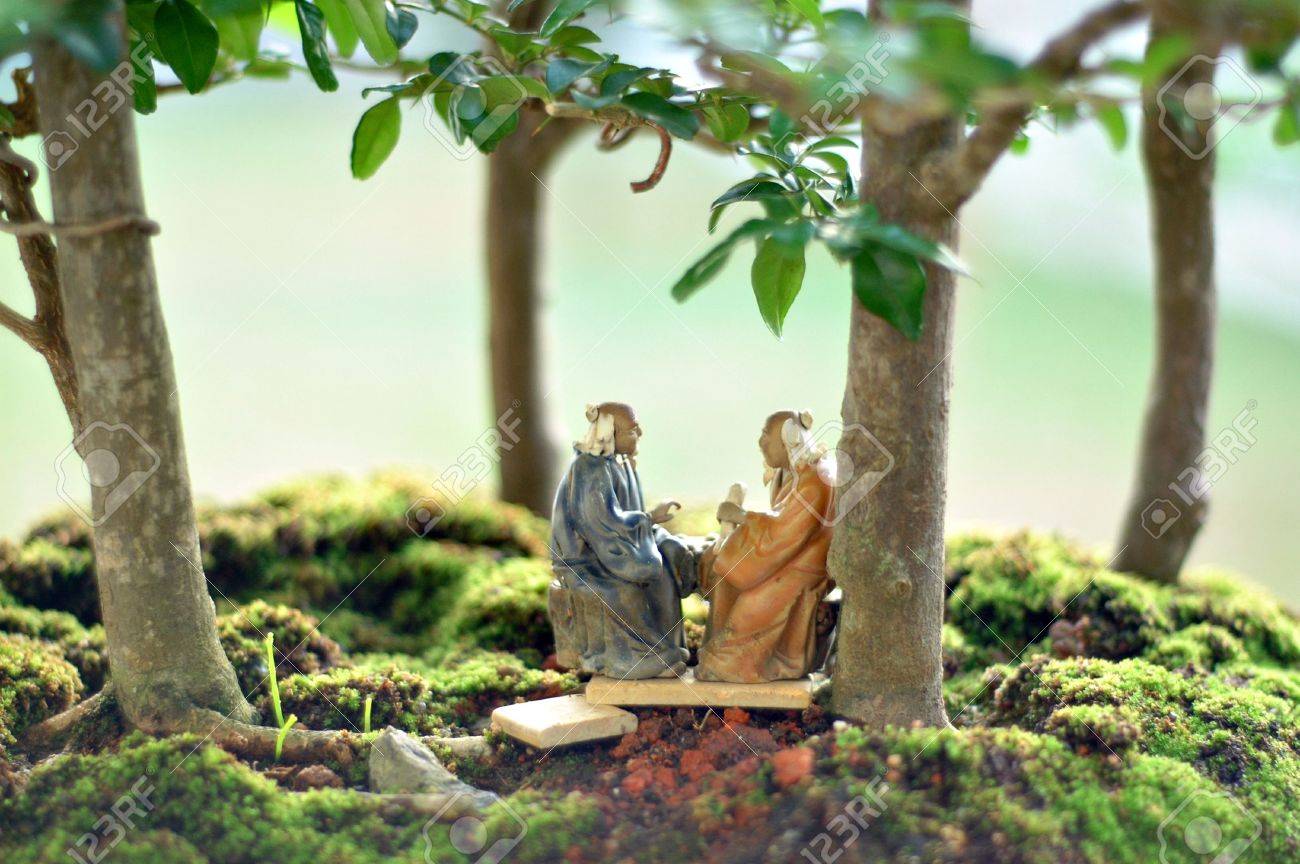 Bonsai Tree With Small Figurines Stock Photo Picture And Royalty Free Image Image 9937804