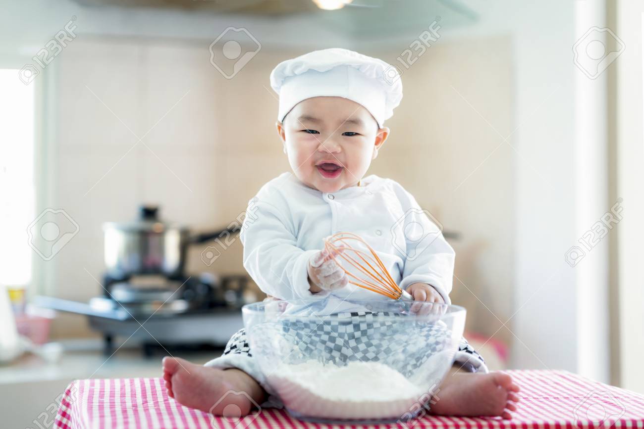 Asian Baby In Kitchen Newborn Baby Concept For Job Career Stock Photo Picture And Royalty Free Image Image 95322321