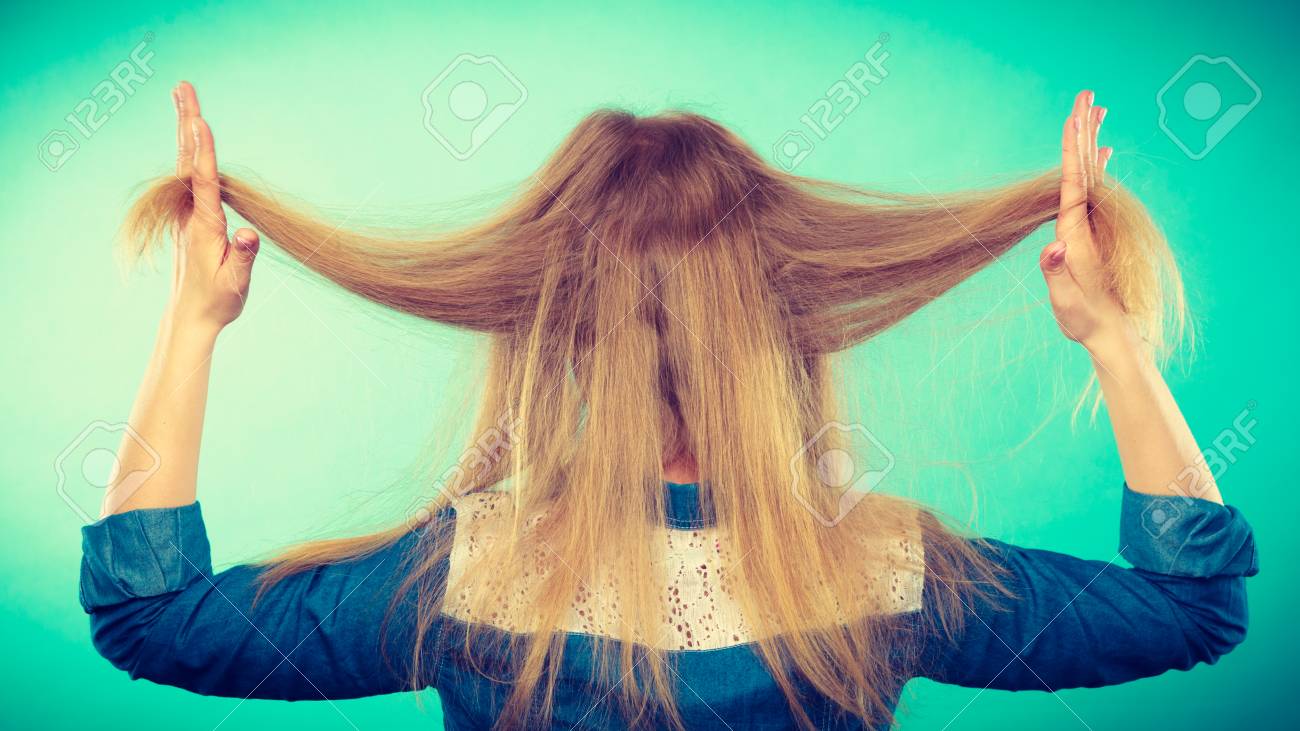 Hairstyle And Hairdo Haircare Concept Back View Of Blonde Woman