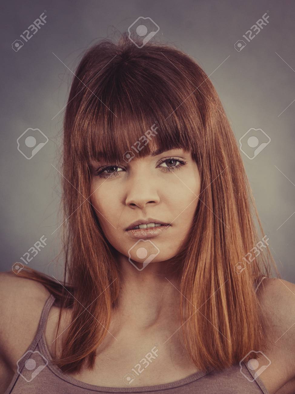 Pretty Young Woman Having Fringe Brown Hair Hairstyle Studio