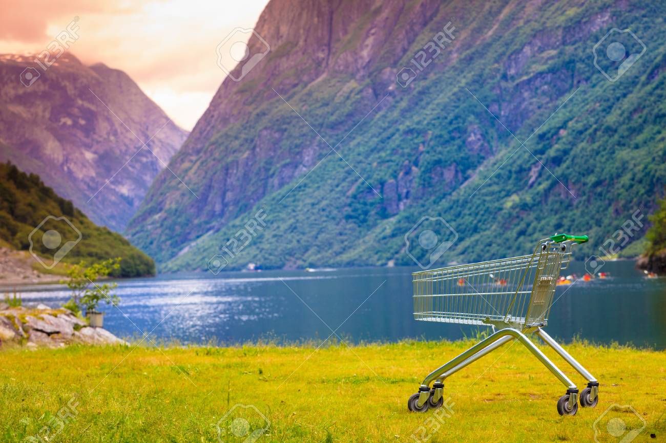 Random Shopping Cart Trolley In Nature Norwegian Green Background Landscape Tourism Buying Concept Stock Photo Picture And Royalty Free Image Image 97503921