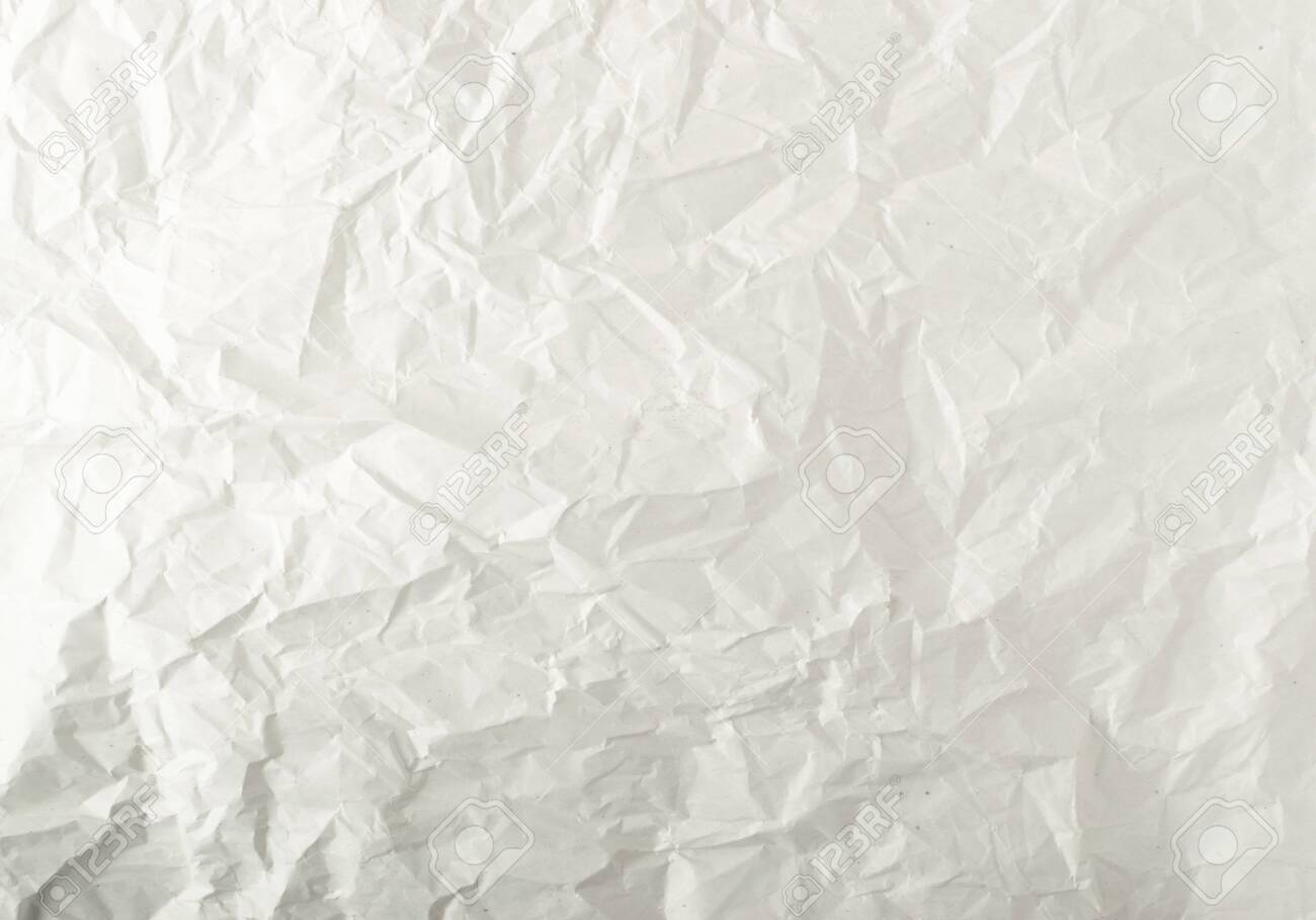 Sheet Of White Thin Crumpled Craft Paper Background Top View. Wrinkled Grey  Wrapping Paper Texture Or Pattern Stock Photo, Picture and Royalty Free  Image. Image 124784573.