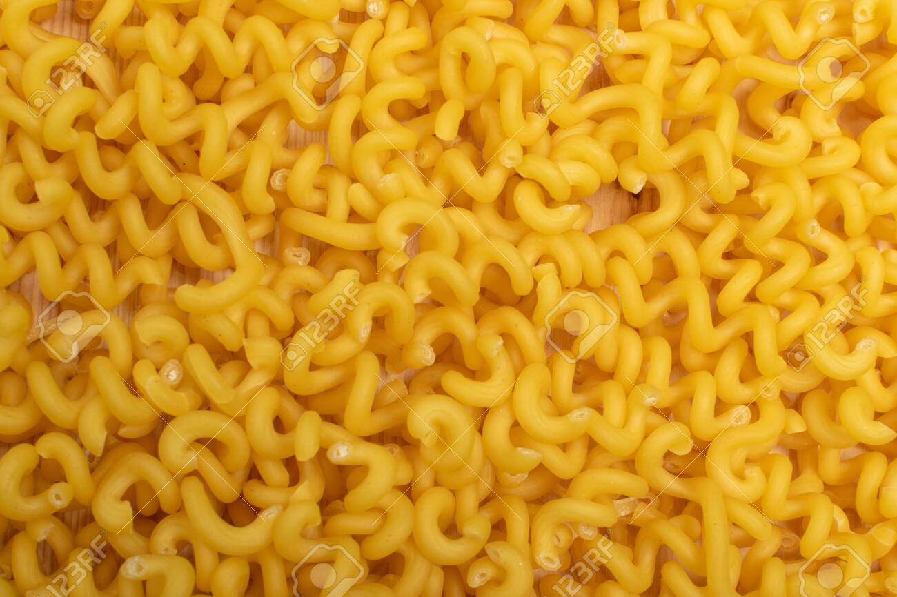 Download Raw Yellow Cavatappi Pasta Texture Background Top View Pile Stock Photo Picture And Royalty Free Image Image 134094770 Yellowimages Mockups