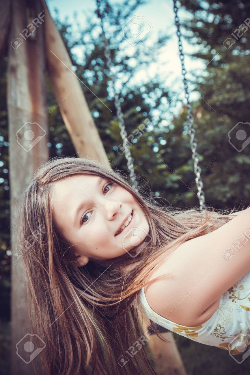 Beautiful Girl On The Swing Stock Photo Picture And Royalty Free