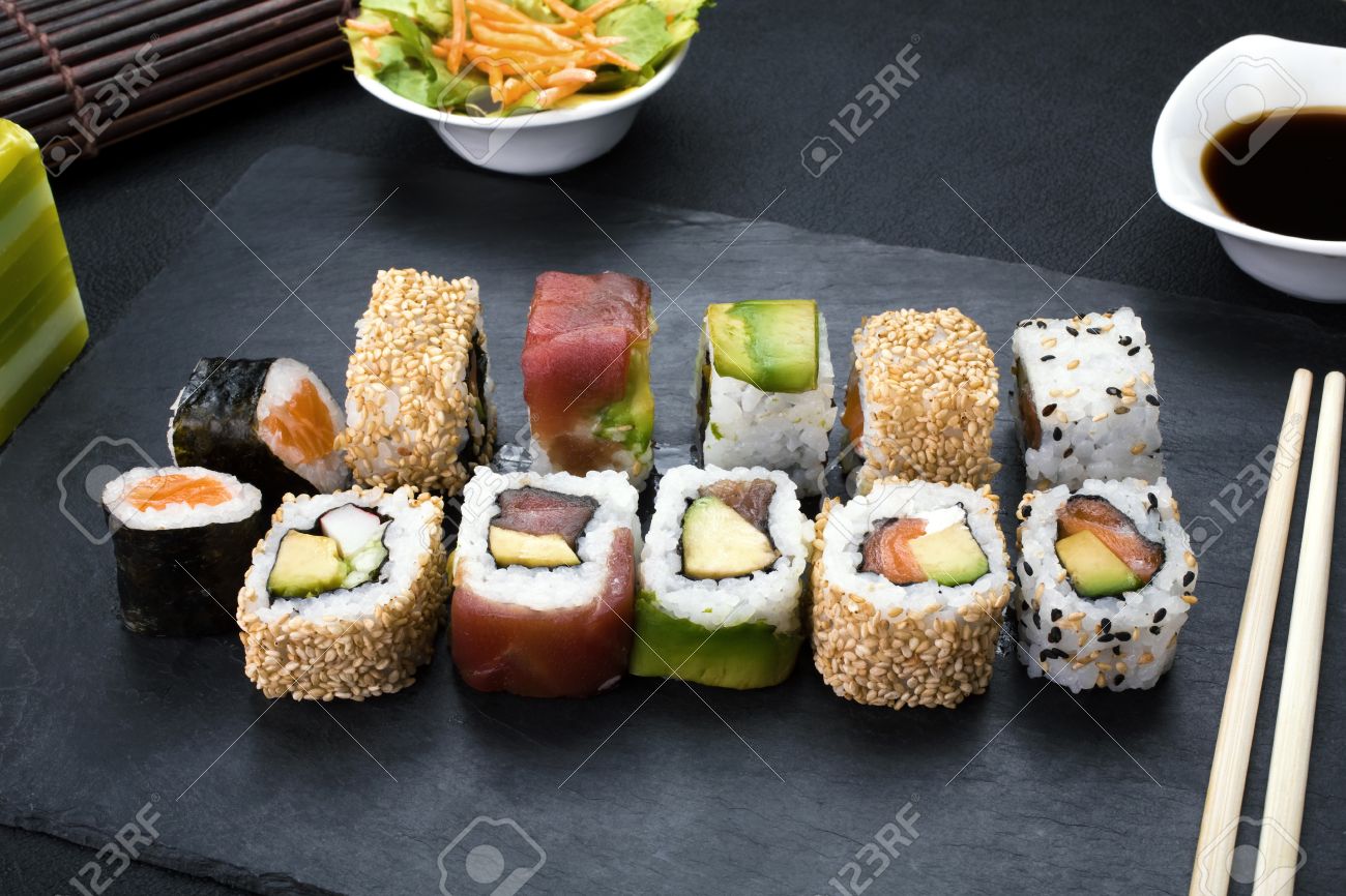 closeup of platter with sushi menu assorted on the table restaurant sushi rolls - 40589590 closeup of platter with sushi menu assorted on the table restaurant sushi rolls - 40589590