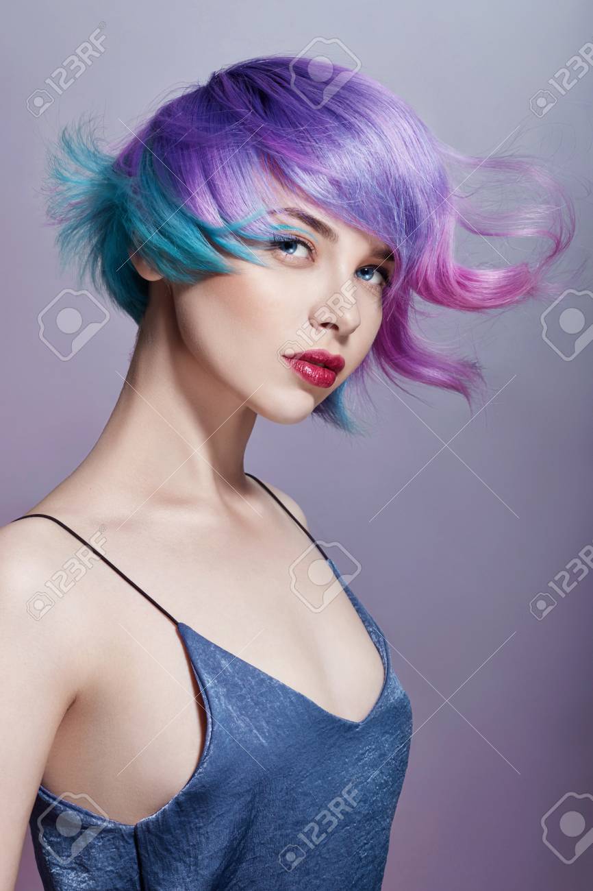 Portrait Of A Woman With Bright Colored Flying Hair All Shades