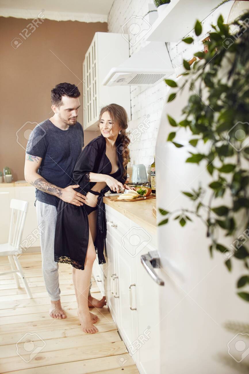 Couple In Love Has Breakfast In The Kitchen Early In The Morning Stock Photo Picture And Royalty Free Image Image 128237861