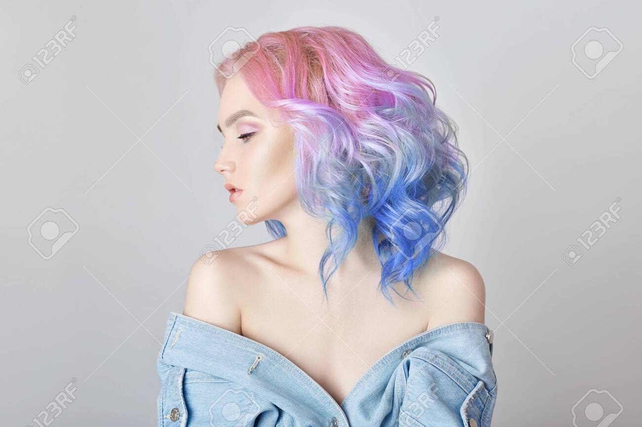 Portrait Of A Woman With Bright Colored Flying Hair, All ...