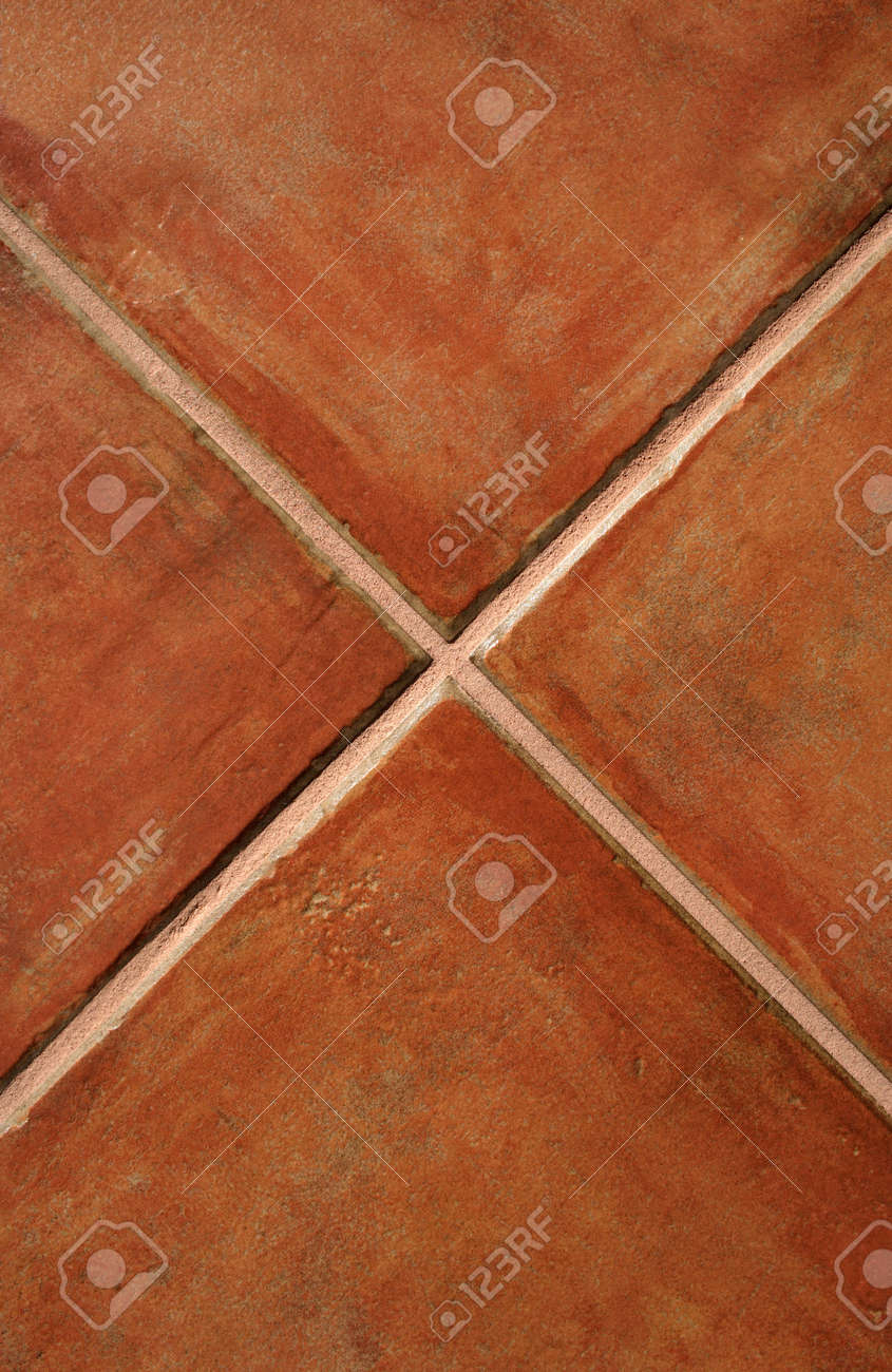 Closeup Of Terracotta Ceramic Tiles Making A Cross Stock Photo