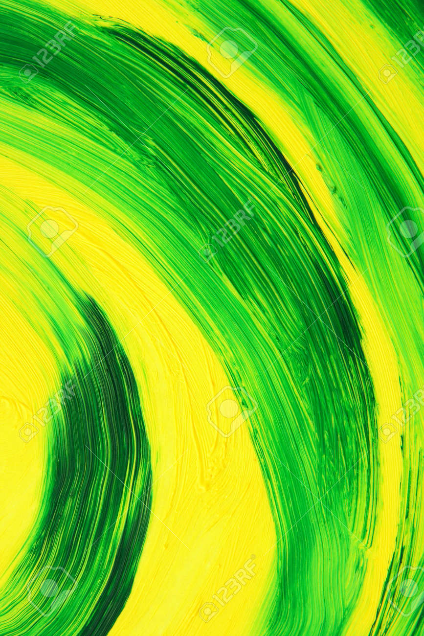 green and yellow oil-painted abstract curves. texture of brush green and yellow oil-painted abstract curves. texture of brush