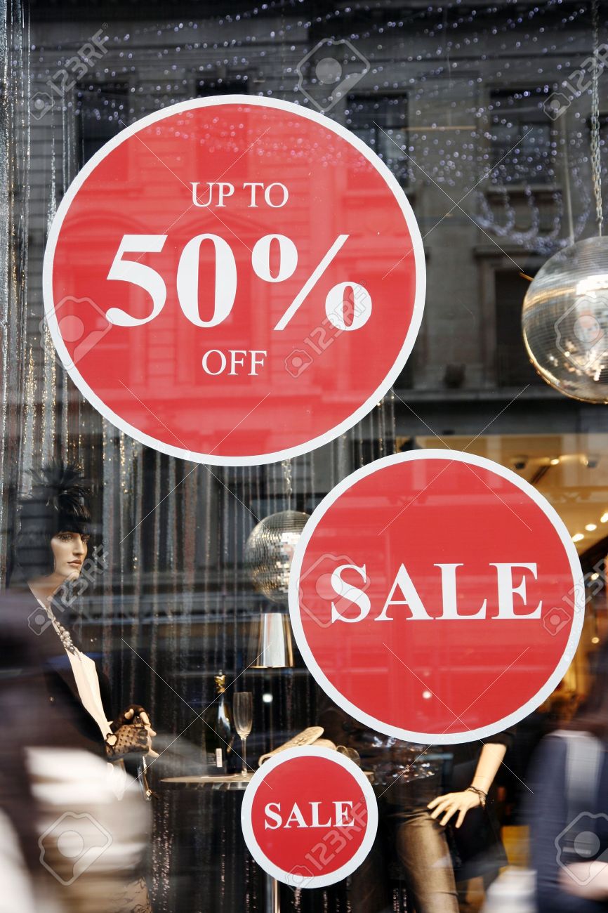sale signs in shop window big reductions stock photo picture and window sale sign
