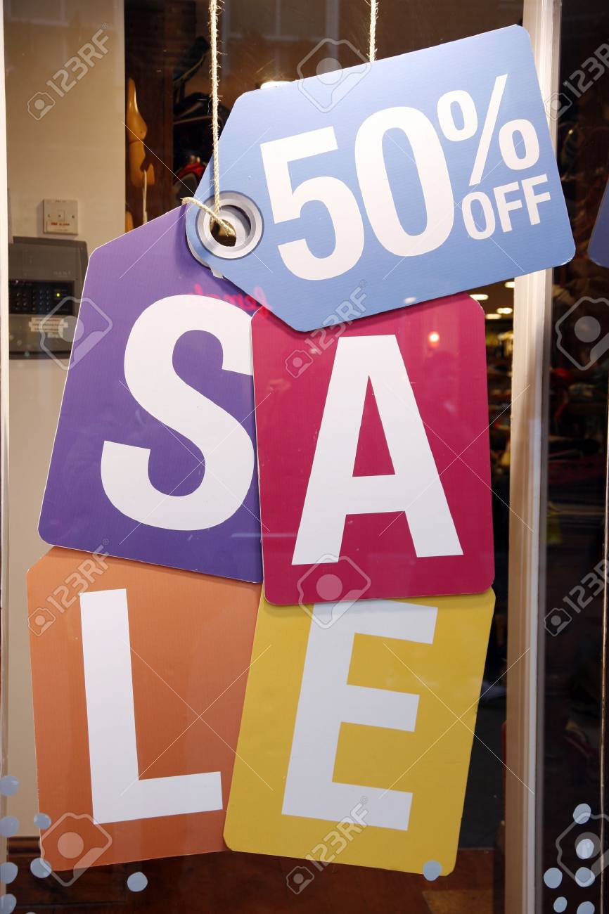 sale signs in shop window big reductions stock photo picture and window sale sign