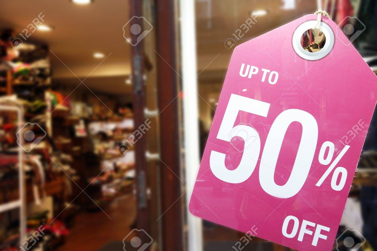 sale signs in shop window big reductions stock photo picture and store sale signs