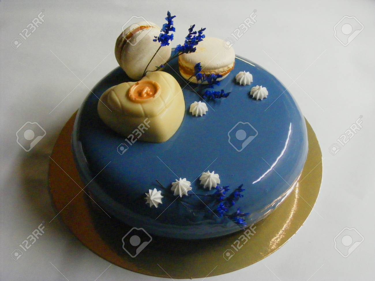 Cake With Berry Mousse In The Mirror Glaze With Chocolate Decoration And Macarons Stock Photo Picture And Royalty Free Image Image