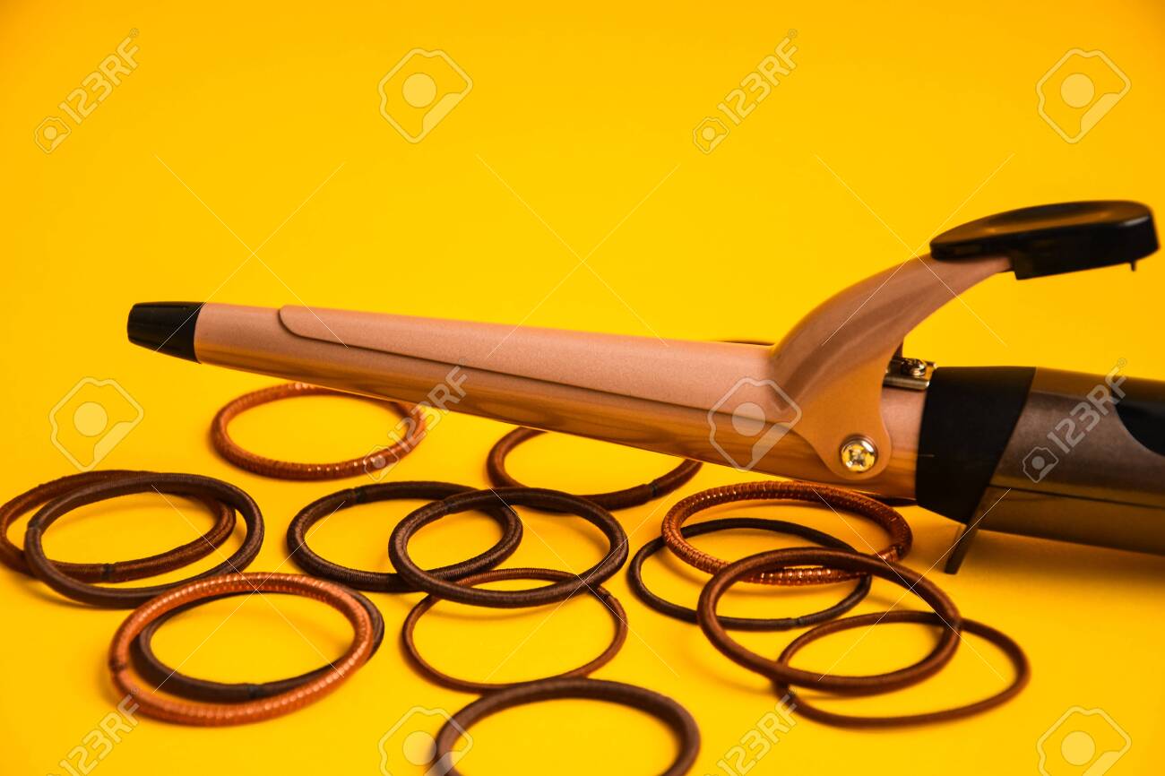 yellow curling iron