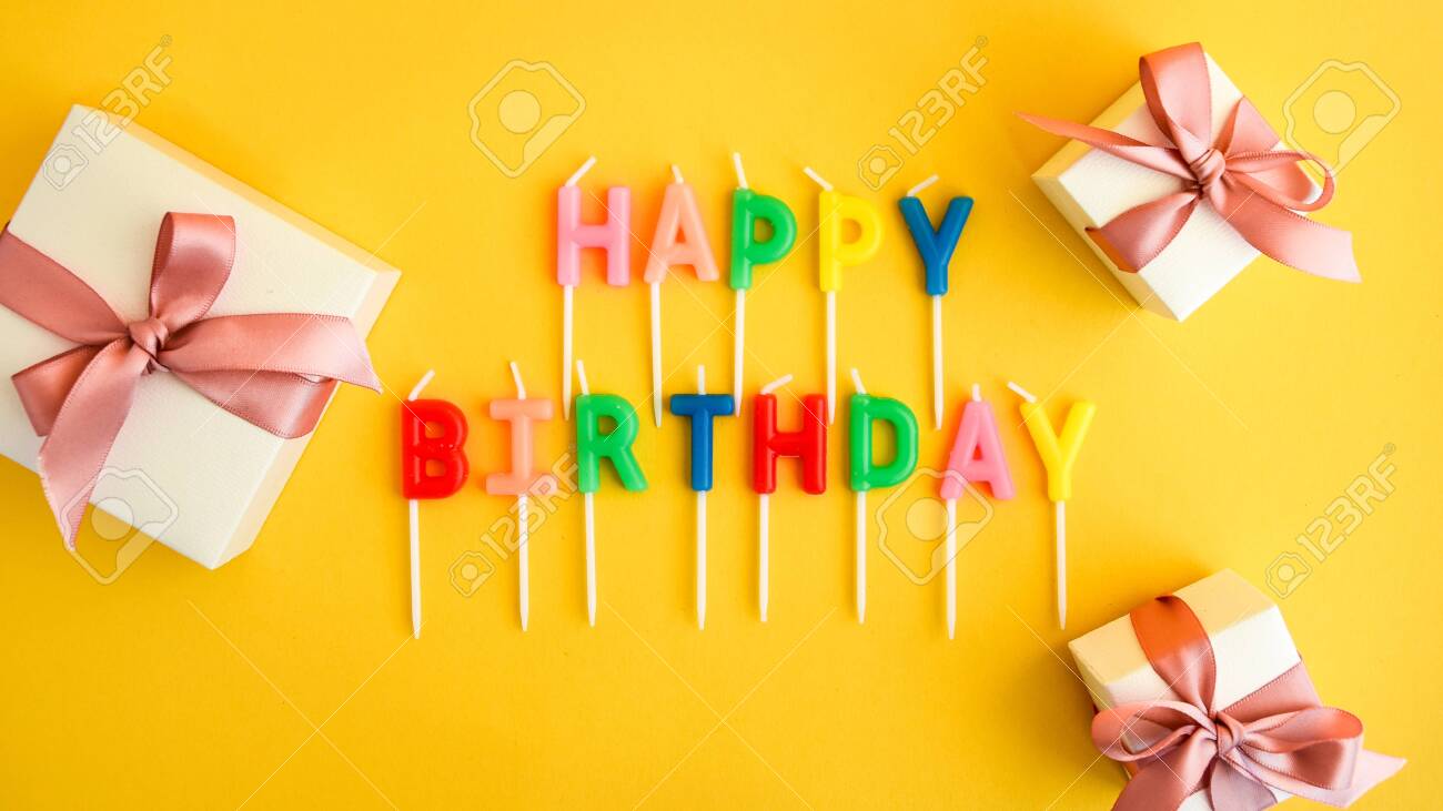 Happy Birthday Candles On Yellow Background Bright Color Wallpaper Stock Photo Picture And Royalty Free Image Image