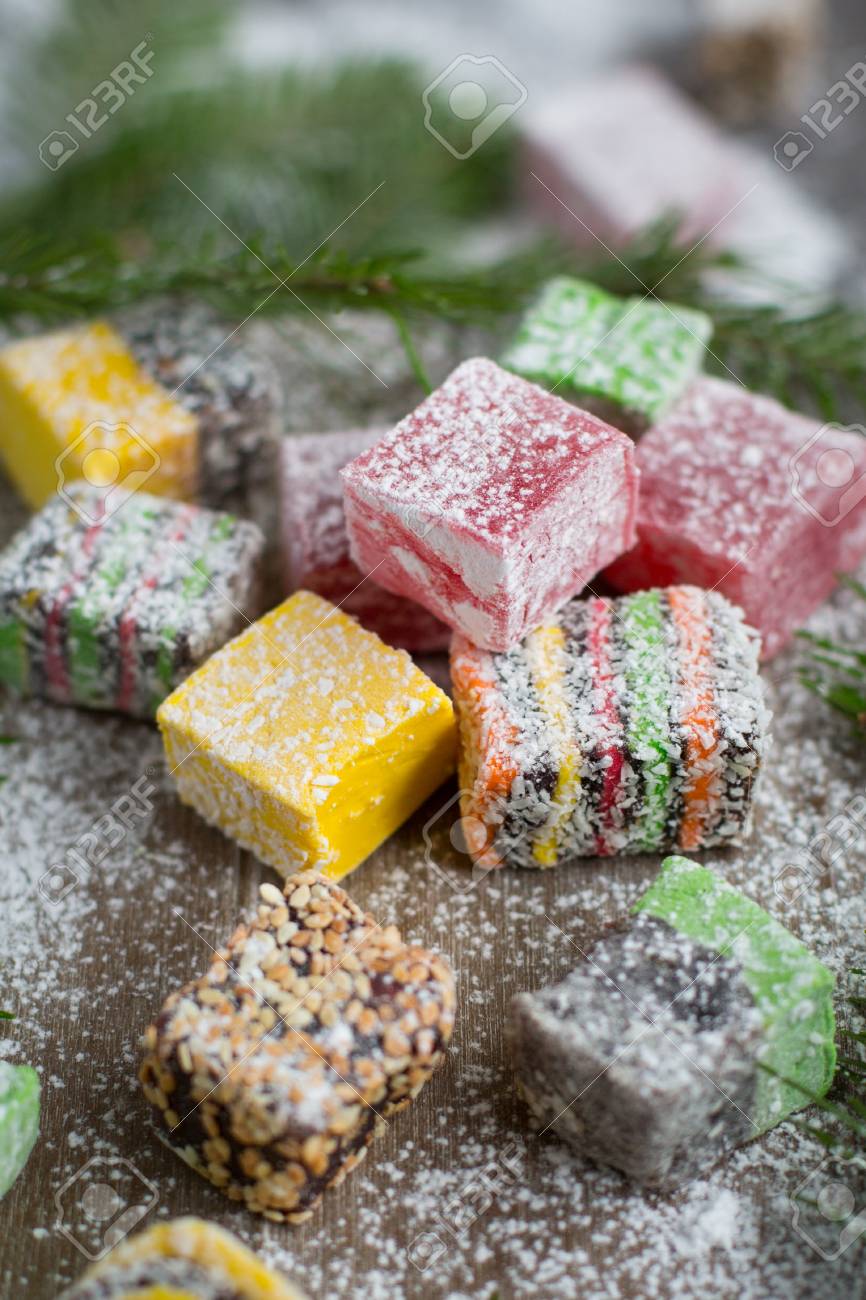 christmas sweets on a wooden background decorated christmas tree christmas goodies ideas