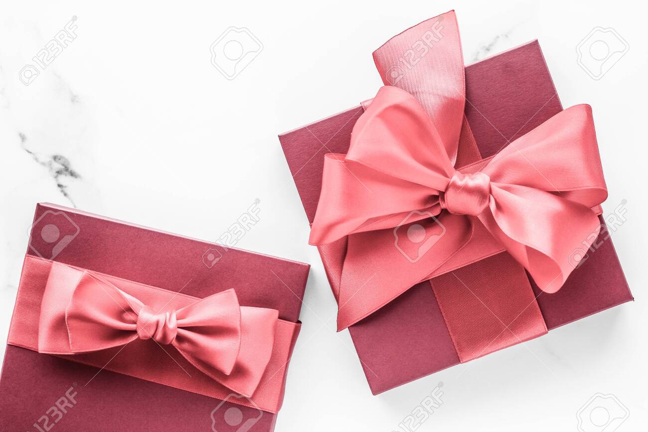 Birthday, Wedding And Girly Branding Concept - Coral Gift Box With Silk Bow  On Marble Background, Girl