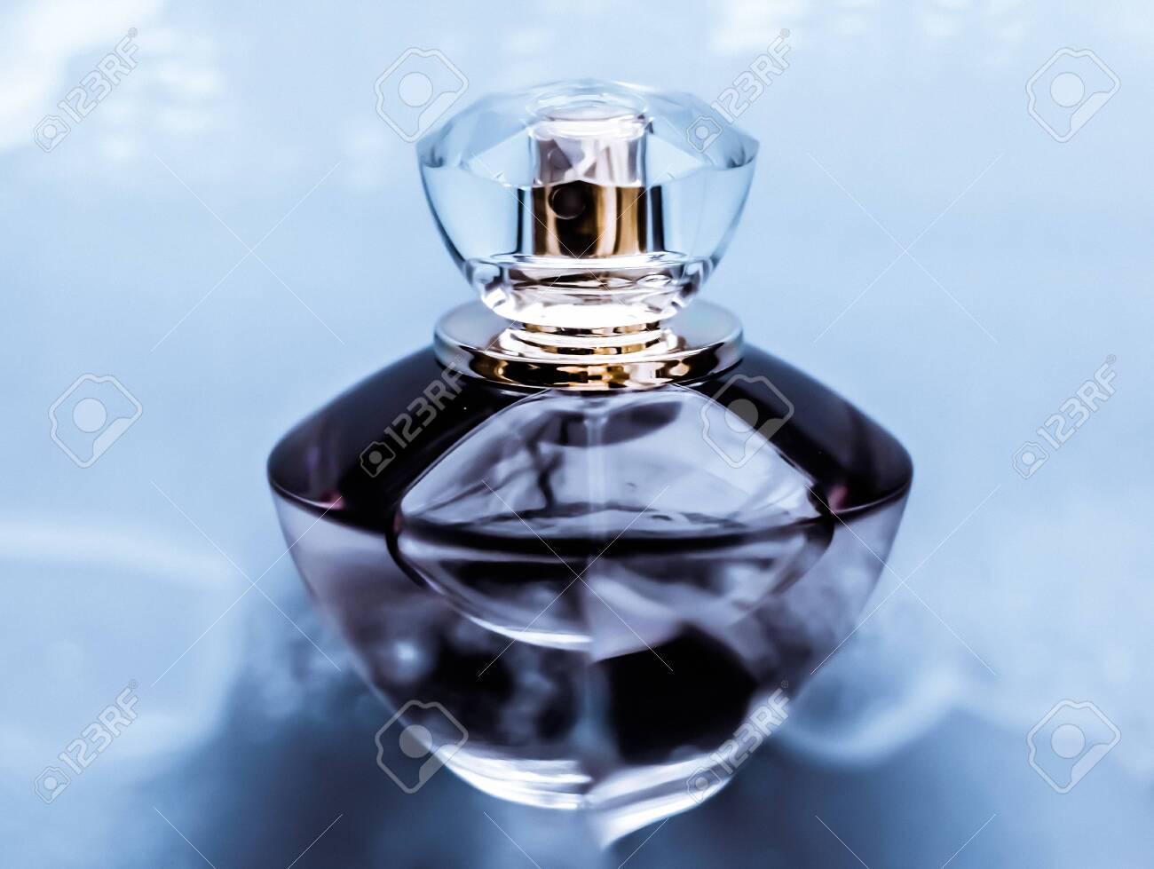 Perfumery, cosmetics and branding concept - Perfume bottle under blue water, fresh sea coastal scent as glamour fragrance and eau de parfum product as holiday gift, luxury beauty spa brand present - 134346463 Perfumery, cosmetics and branding concept - Perfume bottle under blue water, fresh sea coastal scent as glamour fragrance and eau de parfum product as holiday gift, luxury beauty spa brand present - 134346463