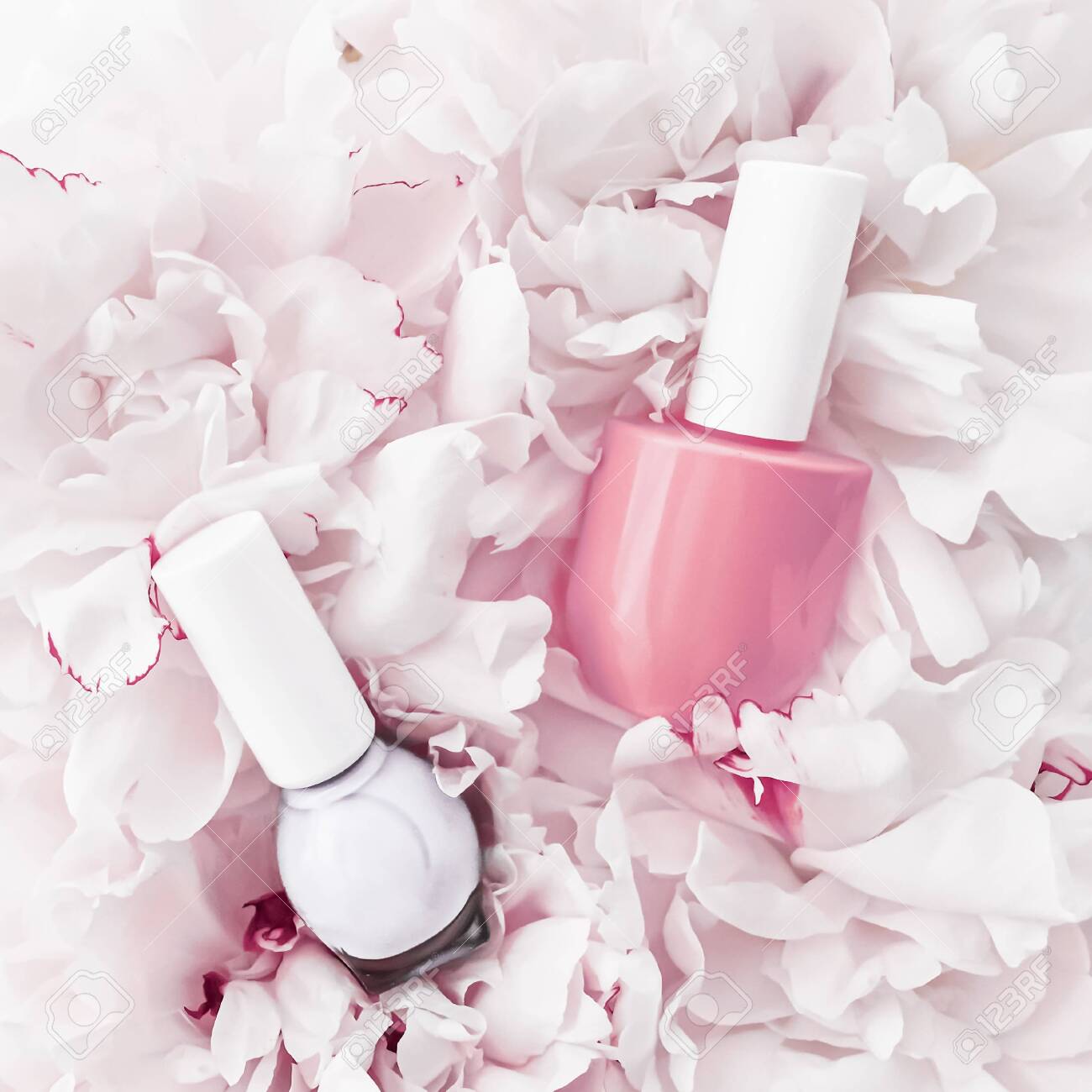 Nail Polish Bottles On Floral Background French Manicure And Cosmetic Branding Design Stock Photo Picture And Royalty Free Image Image 149618598