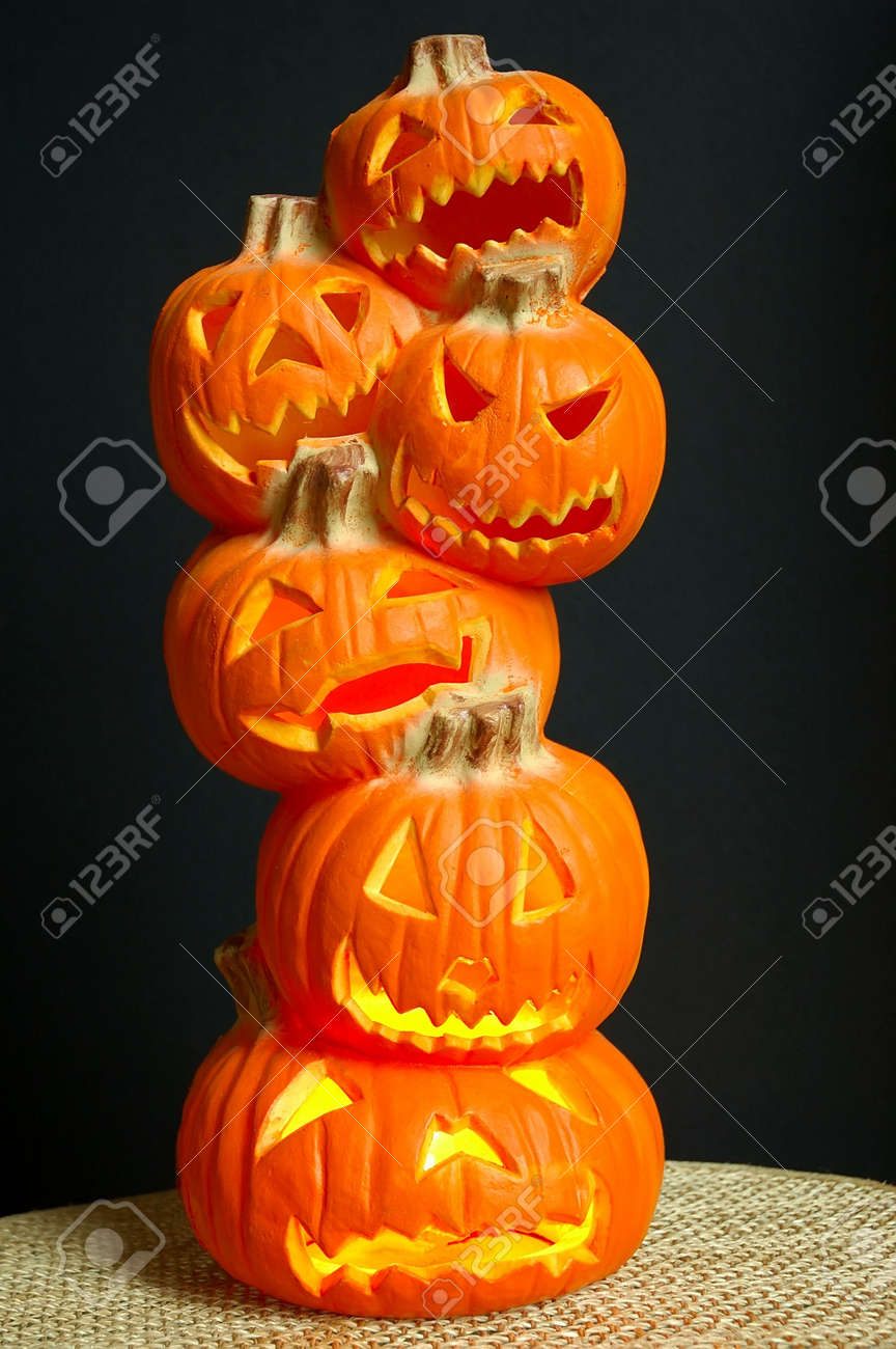 jack o lanterns halloween decoration a stack of pumpkins that have been carved into - Lighted Halloween Decorations jack o lanterns halloween decoration a stack of pumpkins that have been carved into - Lighted Halloween Decorations