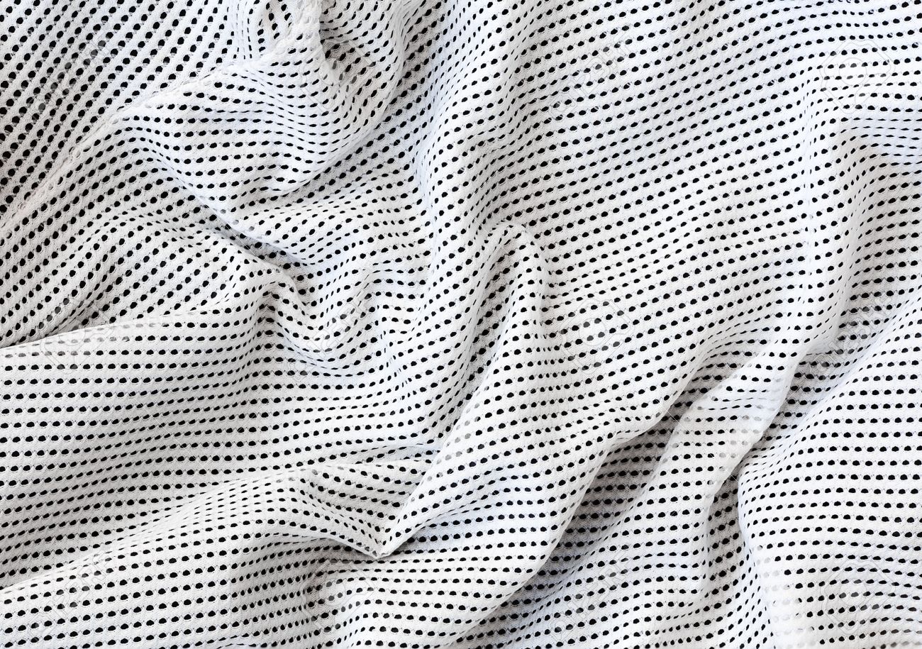 https://previews.123rf.com/images/anoushkatoronto/anoushkatoronto1502/anoushkatoronto150200031/36232072-closeup-macro-texture-of-nylon-perforated-cotton-fabric-clothing-background-with-wrinkles-and-folds.jpg
