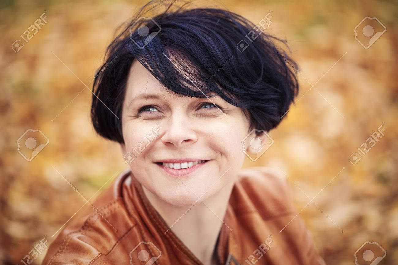 Closeup Portrait Of Middle Aged Caucasian Dark Haired Brunette