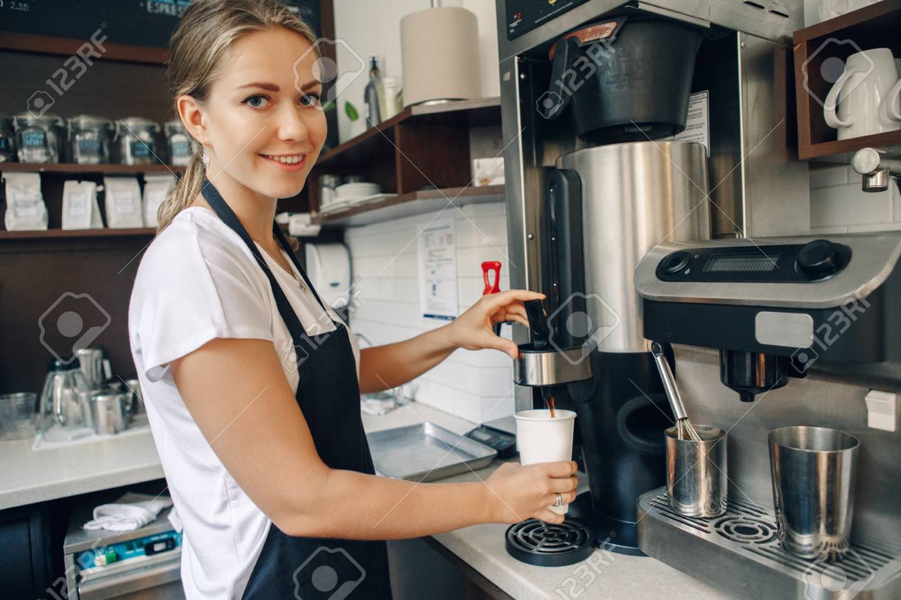 Young Caucasian Barista Hands Holding Paper Cup Making Coffee Young Caucasian Barista Hands Holding Paper Cup Making Coffee