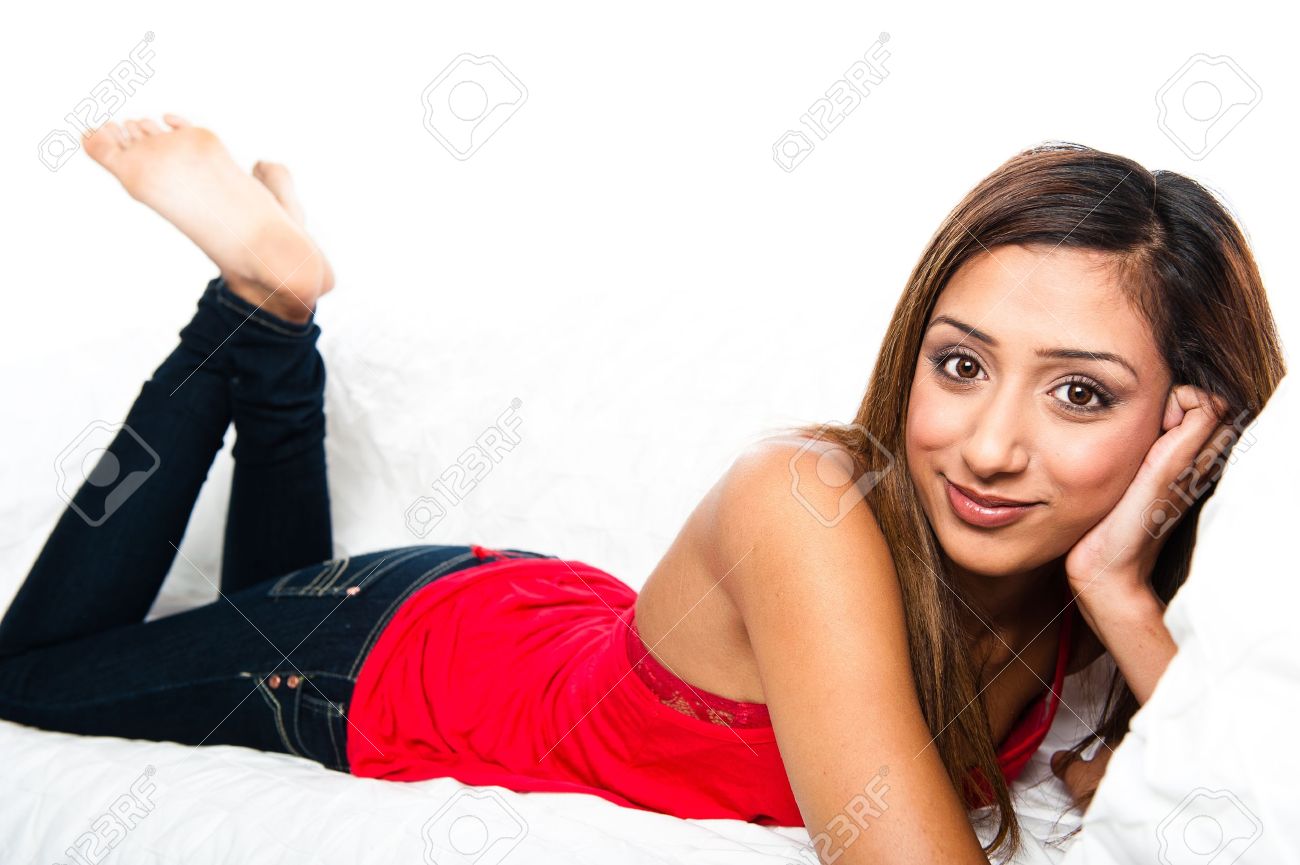 Beautiful Asian Indian Teenage Girl Close Up Of Her Lying Down On The Sofa With Feet Beautiful Asian Indian Teenage Girl Close Up Of Her Lying Down On The Sofa With Feet