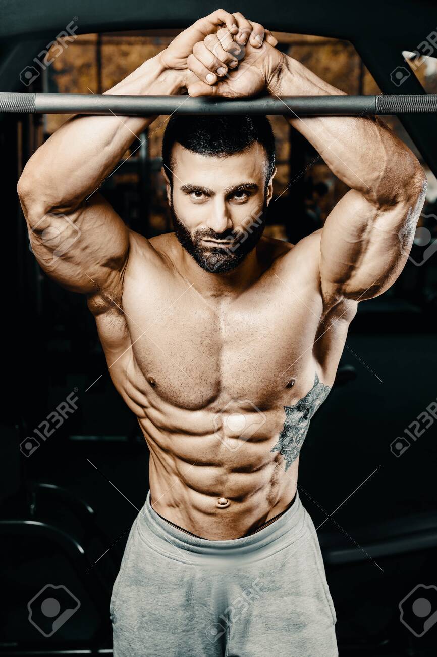 Handsome and muscular male model with a chiseled physique Stock