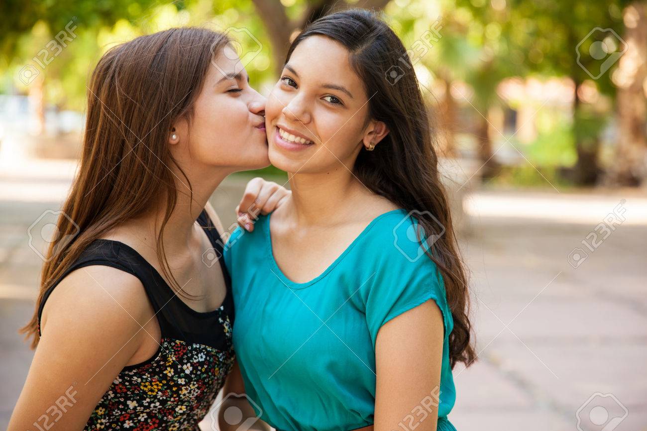 Antonio DiazBeautiful Hispanic Teen Kissing Her