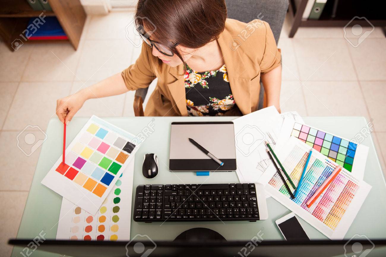 top view of a young graphic designer working on a desktop computer free graphic design work