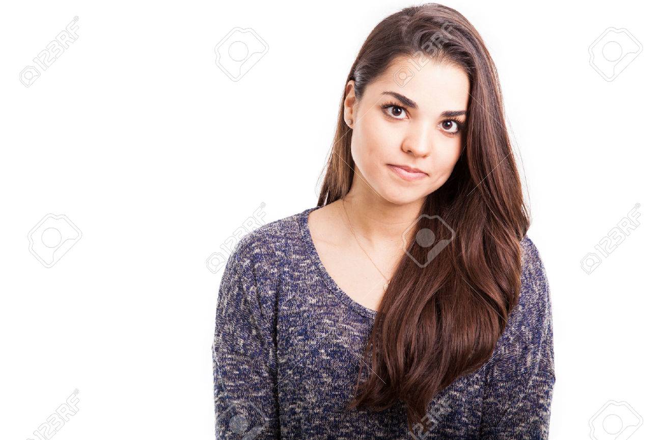 Beautiful Young Hispanic Woman On A White Background Looking Serious Stock Photo Picture And Royalty Free Image Image 37208608