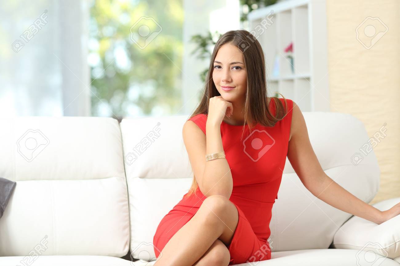 Fashion Housewife Woman In Red Posing photo
