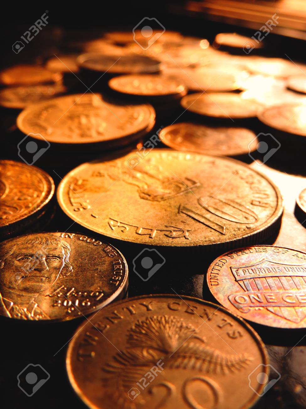 Closeup Of Bunch Of International Coins From Singapore 20 Cents Us 5 1 Cents Closeup Of Bunch Of International Coins From Singapore 20 Cents Us 5 1 Cents