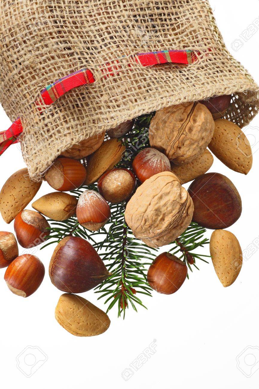 Christmas Stocking with nuts isolated in white - 8379710 Christmas Stocking with nuts isolated in white - 8379710