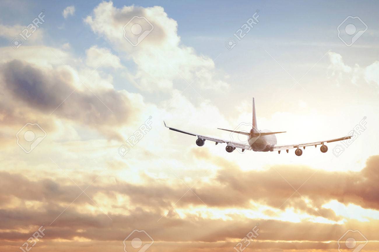 Airplane In Sunset Sky Stock Photo Picture And Royalty Free Image Image 68680390