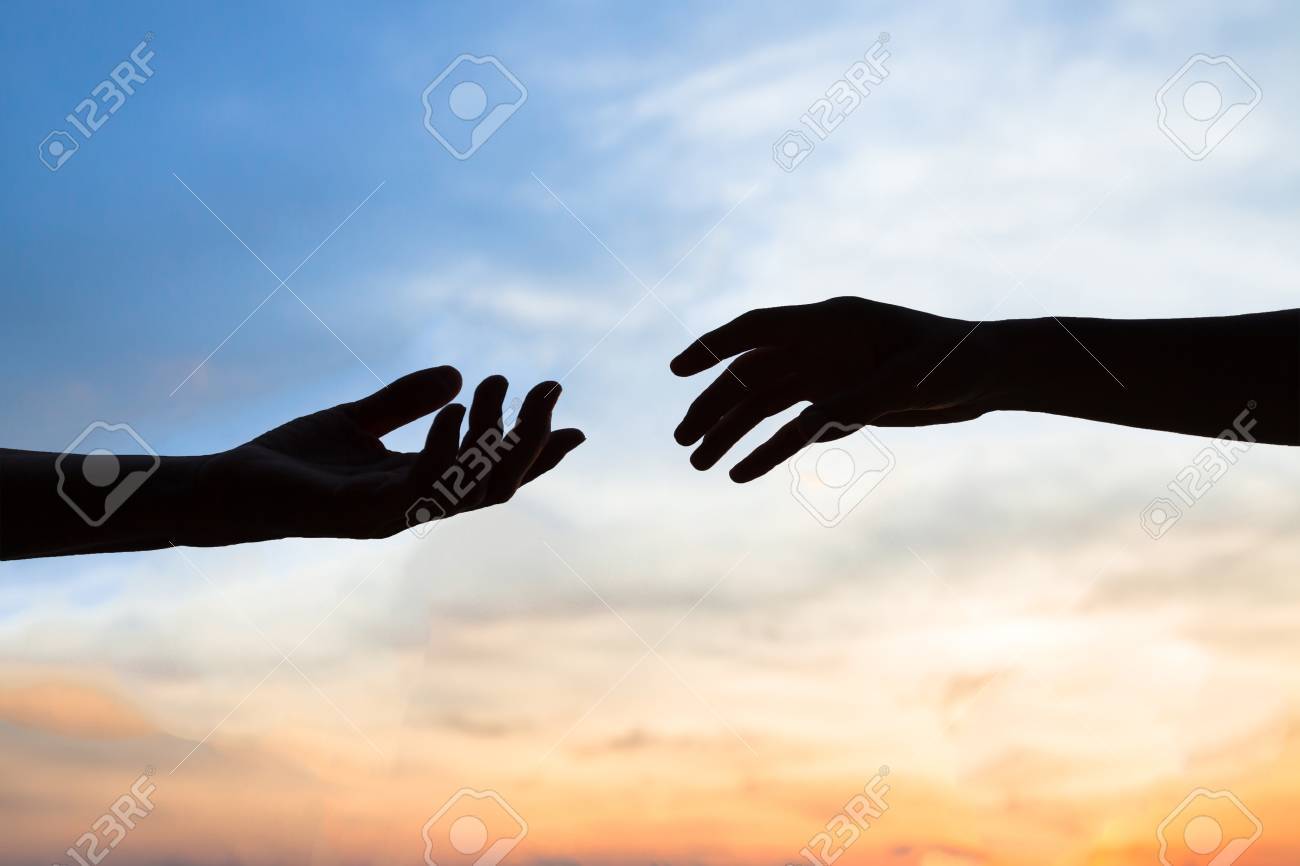 mercy, two hands silhouette on sky background, connection or help concept - 77348807 mercy, two hands silhouette on sky background, connection or help concept - 77348807