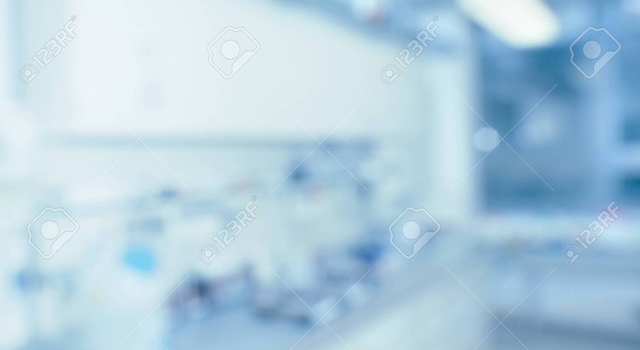 Blurred laboratory interior, scientific background with copy-space. Modern research facility room out of focus. Blue toned blurred image. - 130812553 Blurred laboratory interior, scientific background with copy-space. Modern research facility room out of focus. Blue toned blurred image. - 130812553