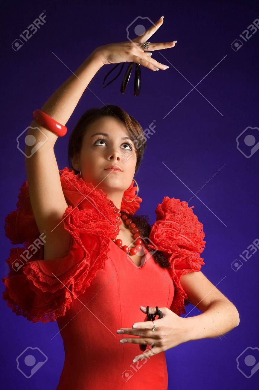 彼女のカスタネットと美しいスペインのフラメンコ ダンサー の写真素材 画像素材 Image