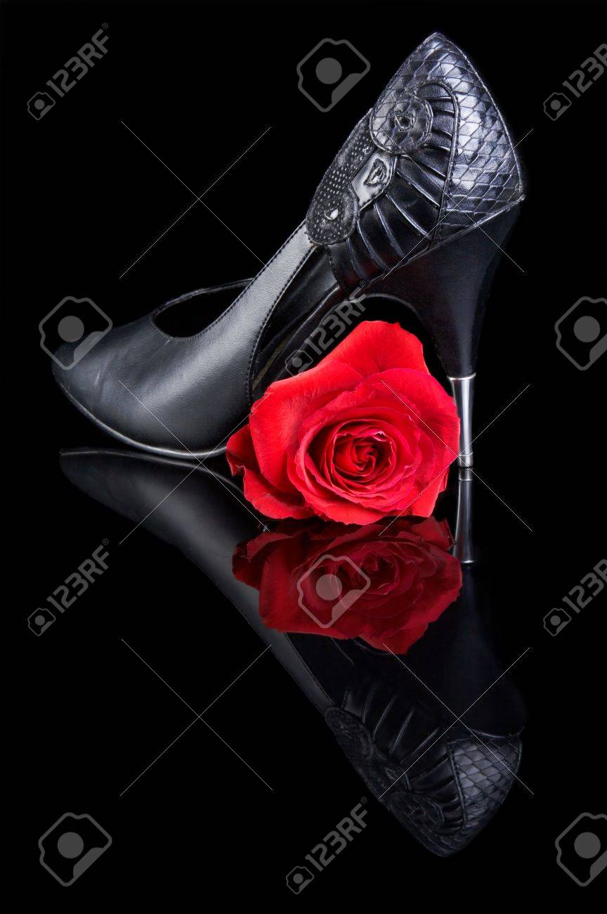 black shoes with red roses