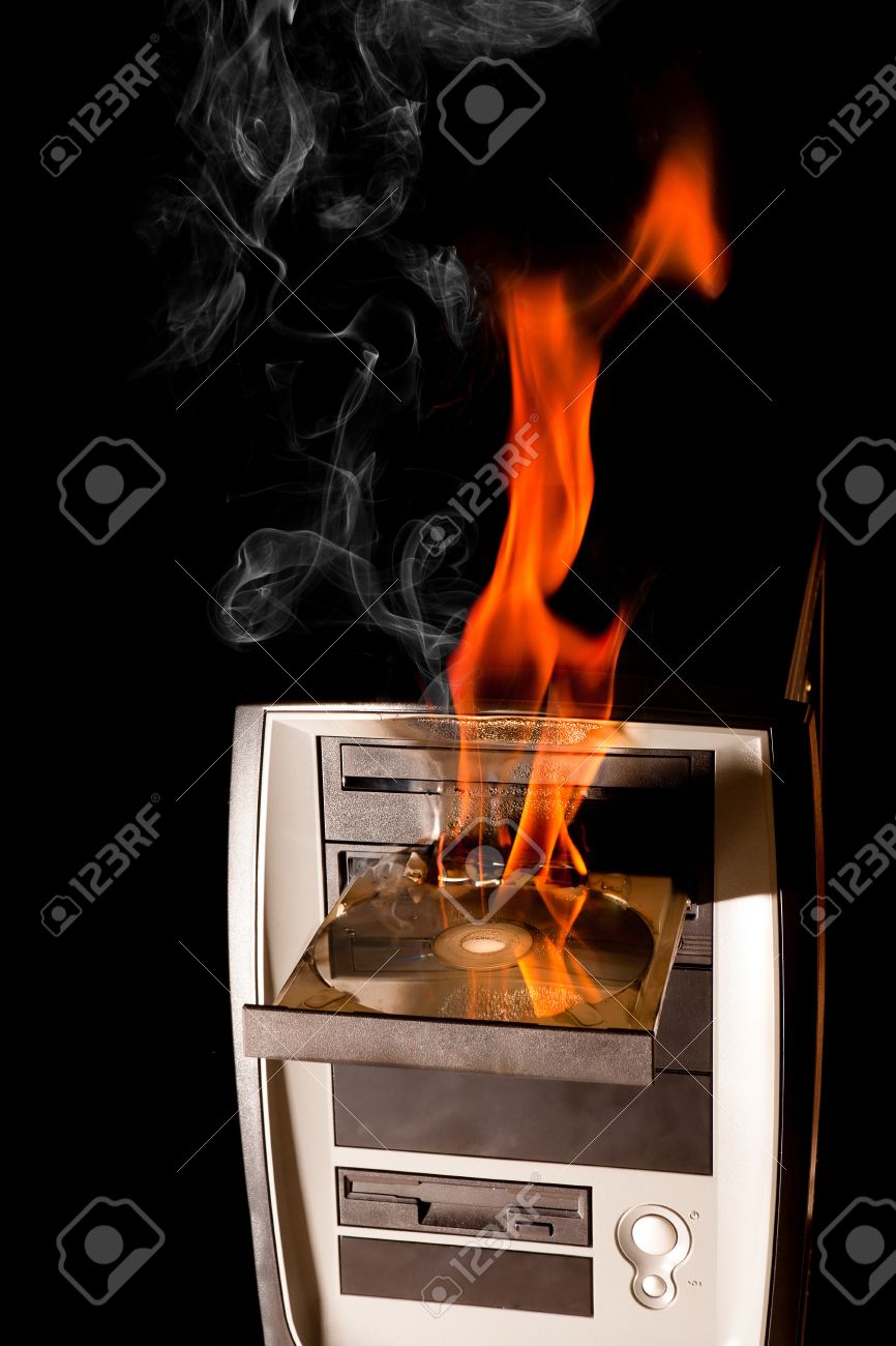 burning computer and dvd drive on fire stock photo picture and burning computer