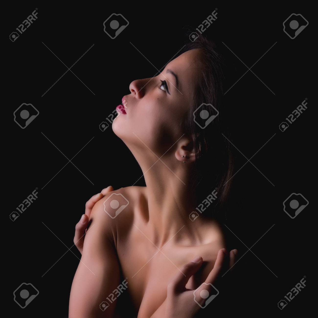 Implied Nudity Fine Art Image Of A Woman Isolated On Black Stock Photo,  Picture and Royalty Free Image. Image 62625249.