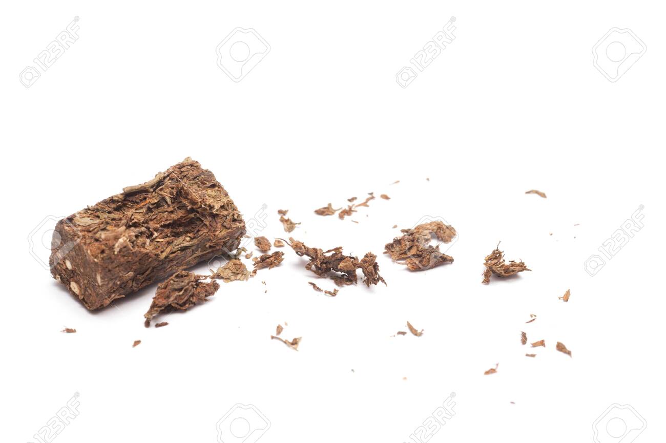 Compacted dried marijuana isolated over white background. - 148297447 Compacted dried marijuana isolated over white background. - 148297447
