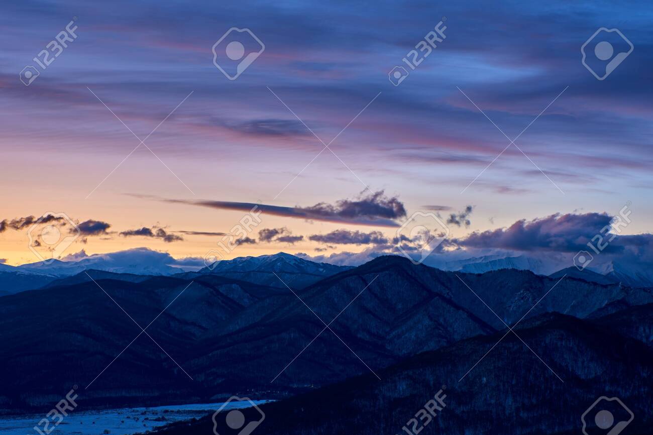 Purple Blue Clouds In The Dawn Sky Over A Mountain Range Dark Stock Photo Picture And Royalty Free Image Image Purple Blue Clouds In The Dawn Sky Over A Mountain Range Dark Stock Photo Picture And Royalty Free Image Image