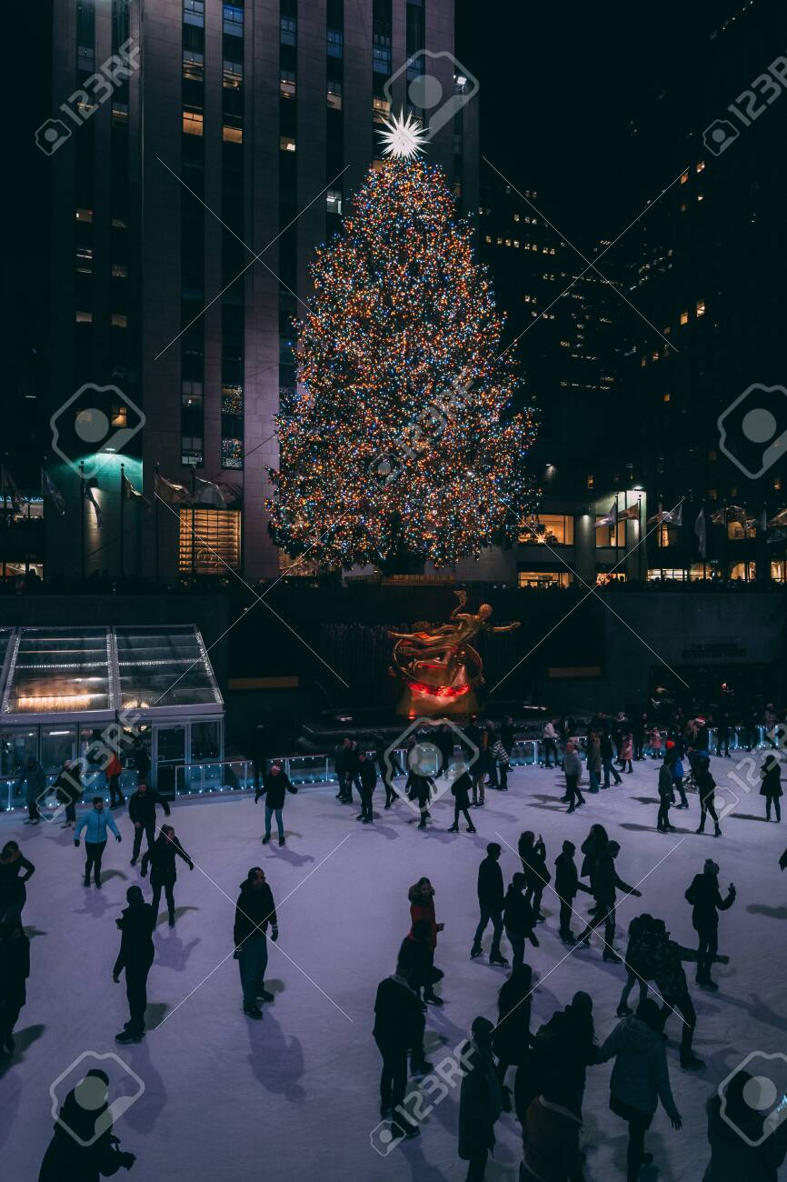 Christmas Tree And Ice Skating Rink At Rockefeller Center At Night In Midtown Manhattan New York City Stock Photo Picture And Royalty Free Image Image 136709824