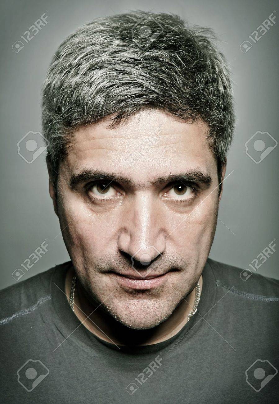 Portrait Of The Adult Man With Gray Hair