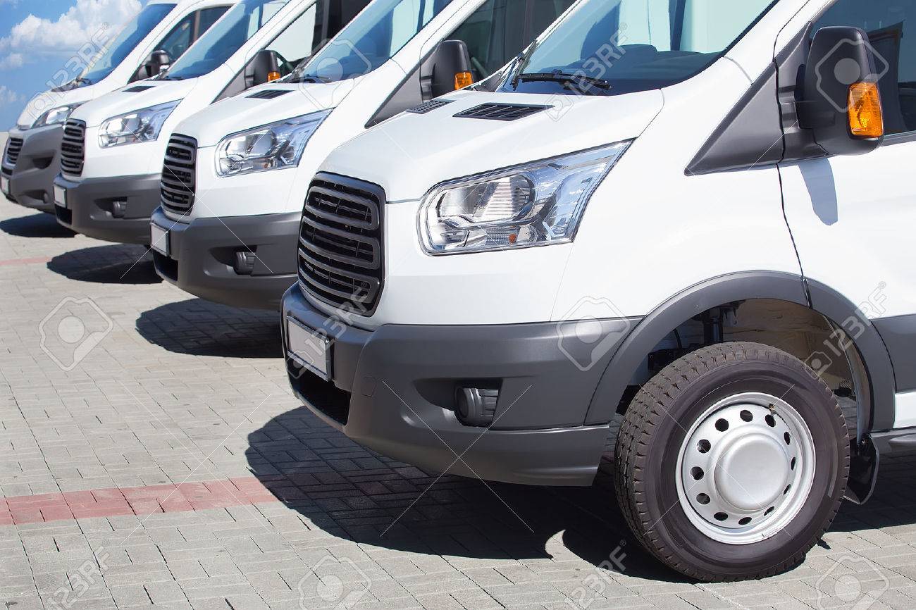 number of new white minibuses and vans outside - 57489887 number of new white minibuses and vans outside - 57489887