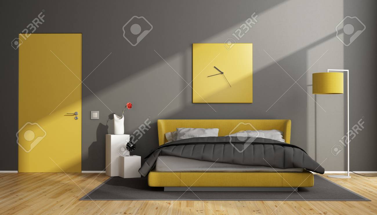 Gray And Yellow Modern Bedroom With Double Bed And Closed Door Stock Photo Picture And Royalty Free Image Image 112259715